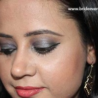 Metallic Grey Smokey Eyes With Orange Lips