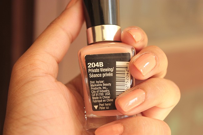 Nude wet n wild nail polish in the color Private Viewing also gold